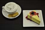 Fake Cappuchino and Cheescake provide sense of scale to dishes. 